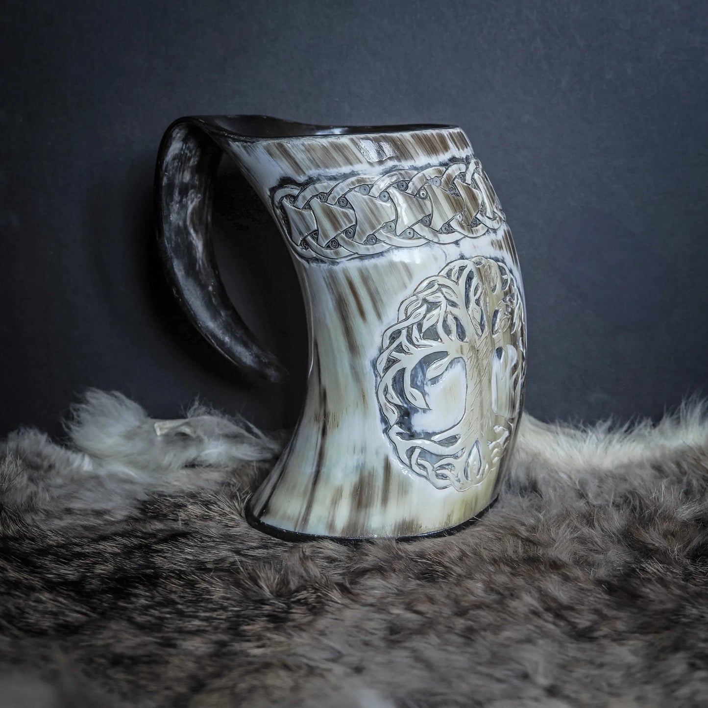 Handsnidad hornmugg, Livets träd